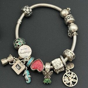 Jewelry Pandora 925 sterling silver gold tone 6.75” charm bracelet with 10 charm